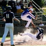 Briarwood's Tanner Cunningham slides into home for a run during Saturday's playoff series at Jack Hayes Field in Clanton.