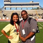 College athlete spotlight: Billingsley graduate and Alabama State University athlete Lori Davis, left, is pictured at the Outdoor Southwestern Athletic Conference Championship with her throwing coach, Prentiss Leeks.