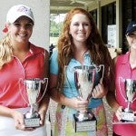 Trophy earned: Madison Sanders (far right) of Clanton finished two strokes out of the lead.