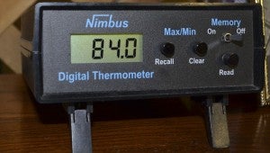 Pictured is the digital machine Turner reads each day to log the temperature. The machine is connected to a stand located outside of Turner's home.