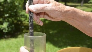 Turner, along with his wife, Imogene Turner, walk every morning before Turner walks to a small, silver tube that resembles a small rocket, in his yard where he checks the amount of rain Clanton might have received on any particular day. Pictured is the measuring device used to determine the amount of rainfall.
