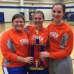 All-tournament: All-tournament team selections Kaley Lucas (left) and Johnna Robertson (center) are pictured with coach Cami Johnson.
