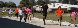 Clanton Middle School students run around the school.