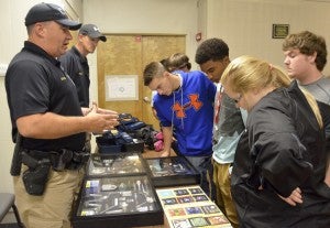Students were given the opportunity to view cases with various drug paraphernalia collected by law enforcement. 