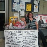 Taking donations: Katy Cooper set up a donation table outside Maplesville Supermarket.