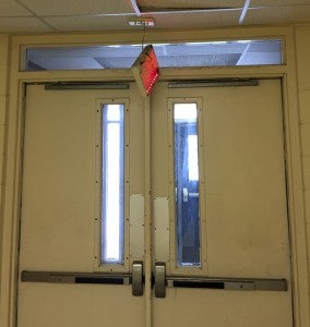 An exit sign located inside the school was pulled off the walls.