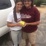 Thorsby senior Taylor McManus and head coach Leighsa Robinson share a moment after McManus’ first career home run was the game-winner against Fayetteville on April 19. Thorsby won 6-4 in eight innings. (Contributed Photo)