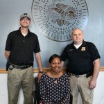 Continuing education: Clanton Police Department detectives David Kline (left) and Robert Bland (right) and Katrina Caver with Clanton Municipal Court all recently earned degrees. (Photo by Stephen Dawkins)
