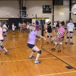 The gym at Isabella High School was packed with varsity and junior varsity squads on Tuesday during a satellite camp led by Auburn assistant volleyball coach Chuck Crawford.   